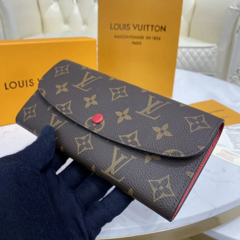 Proving th Louis Vuitton Monogram Canvas Emilie Wallet Red