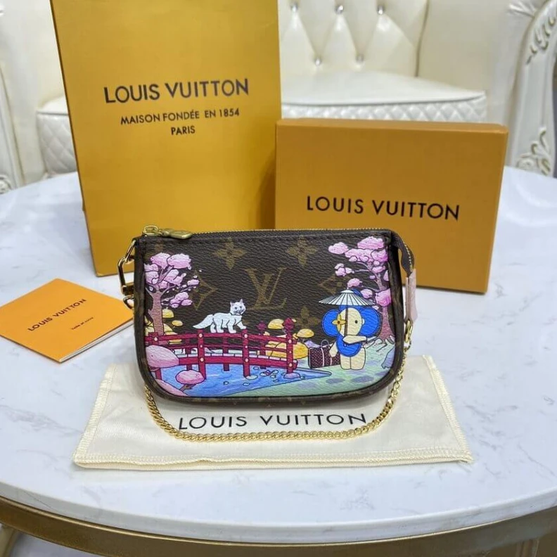 Top lv Chain dro Louis Vuitton Monogram Canvas Mini Pochette Accessoires