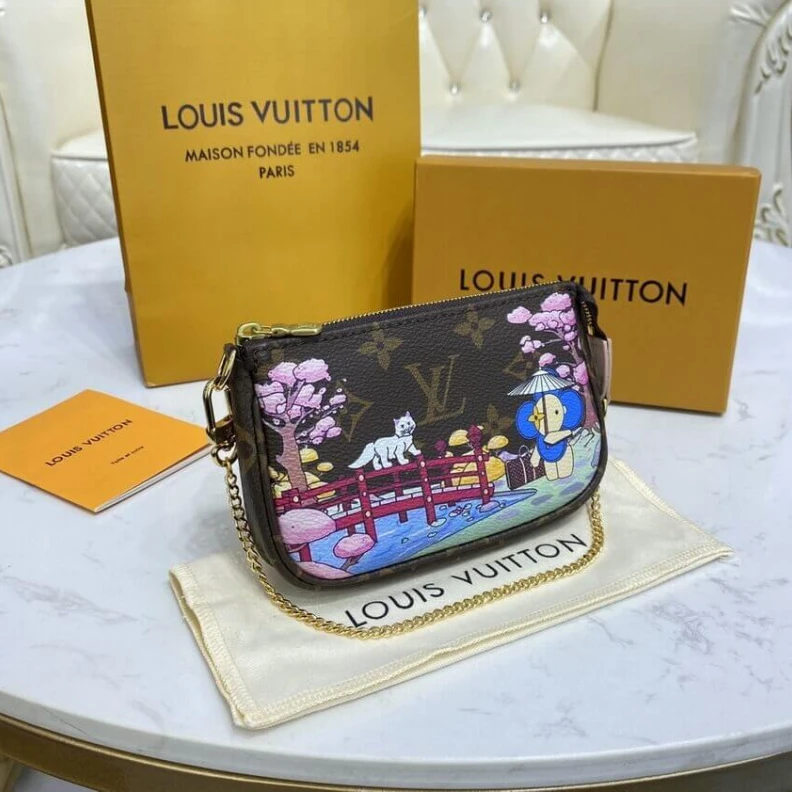 Top lv Chain dro Louis Vuitton Monogram Canvas Mini Pochette Accessoires