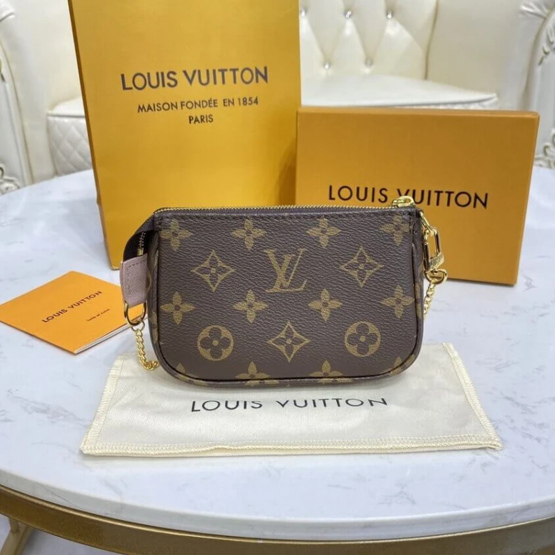 Top lv Chain dro Louis Vuitton Monogram Canvas Mini Pochette Accessoires