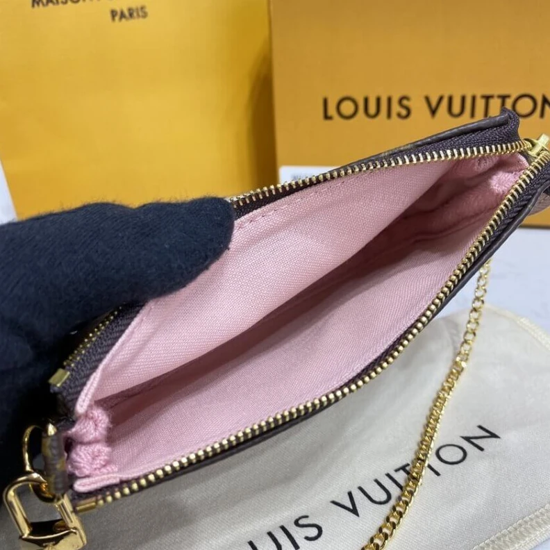 Top lv Chain dro Louis Vuitton Monogram Canvas Mini Pochette Accessoires