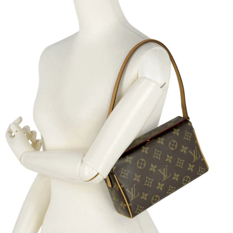 Mythick.ru This is a LV Monogram Canvas Recital Shoulder Bag