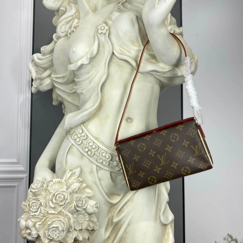 Mythick.ru This is a LV Monogram Canvas Recital Shoulder Bag