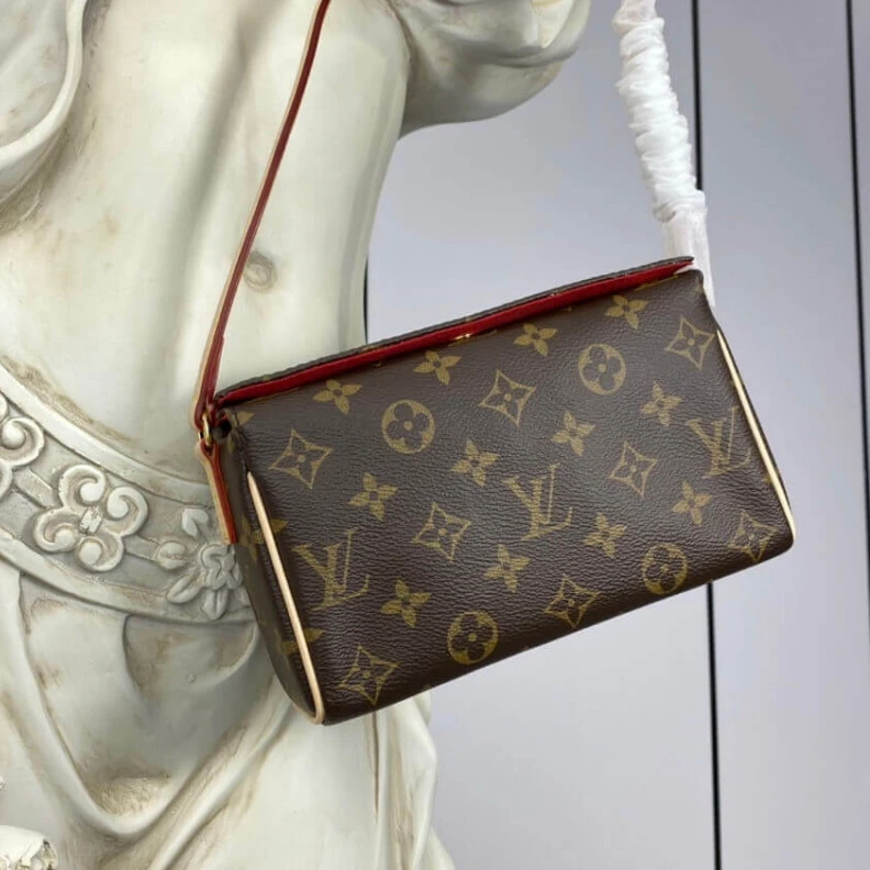 Mythick.ru This is a LV Monogram Canvas Recital Shoulder Bag