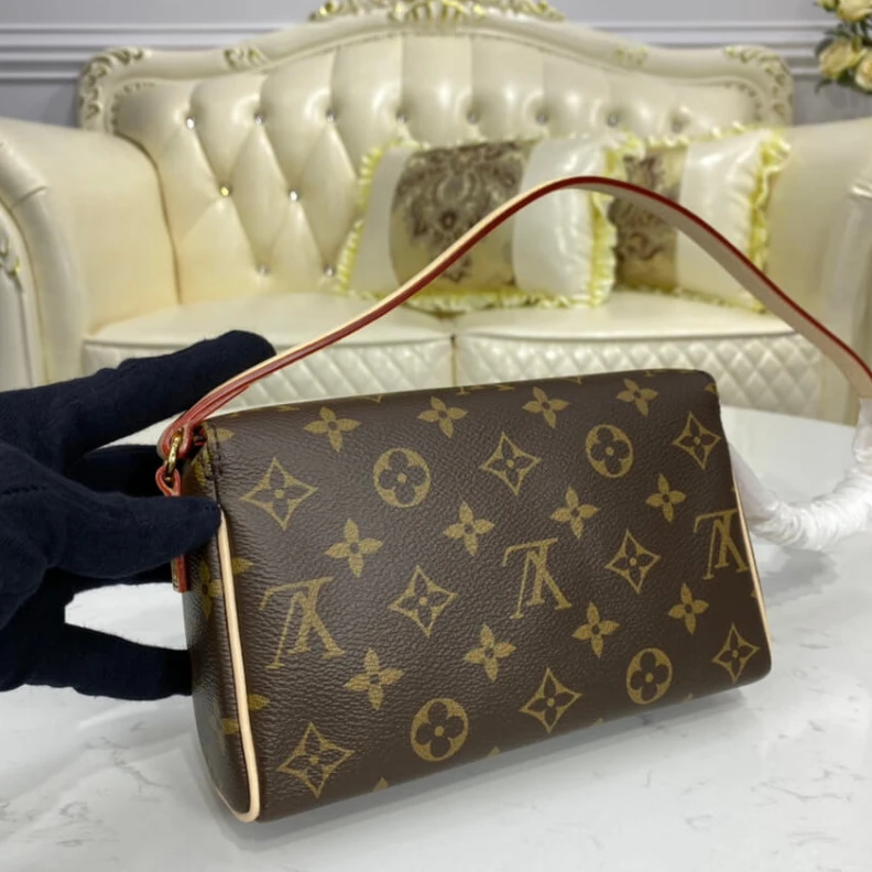 Mythick.ru This is a LV Monogram Canvas Recital Shoulder Bag