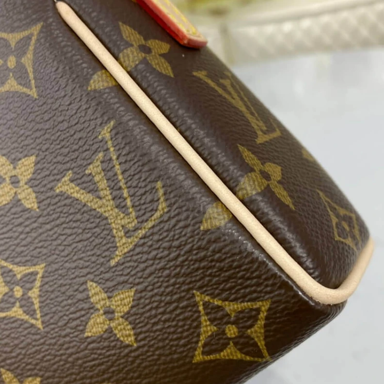 Mythick.ru This is a LV Monogram Canvas Recital Shoulder Bag