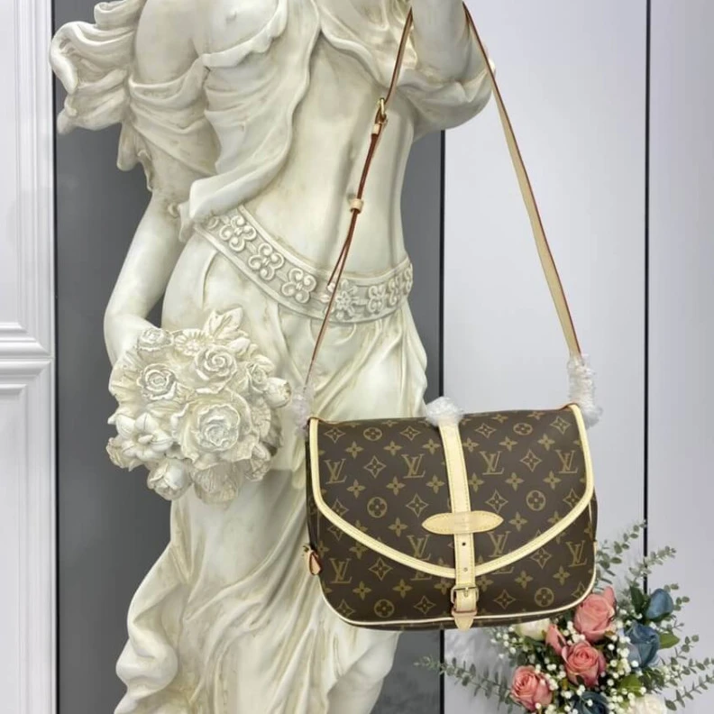 Lv belts replica Embossed Louis Vuitton Monogram Canvas Saumur MM