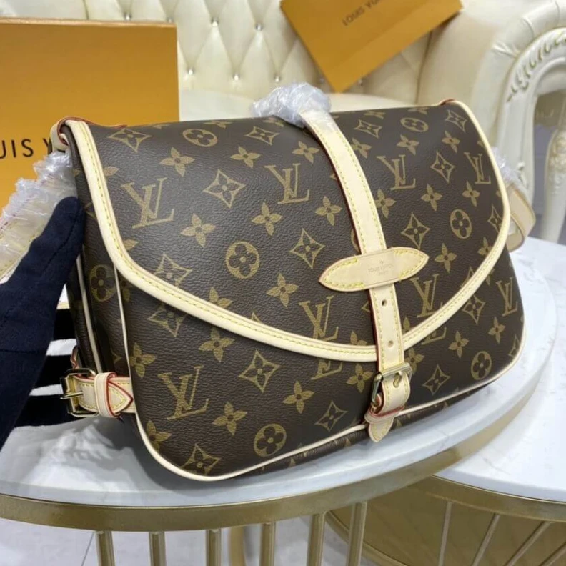 Lv belts replica Embossed Louis Vuitton Monogram Canvas Saumur MM