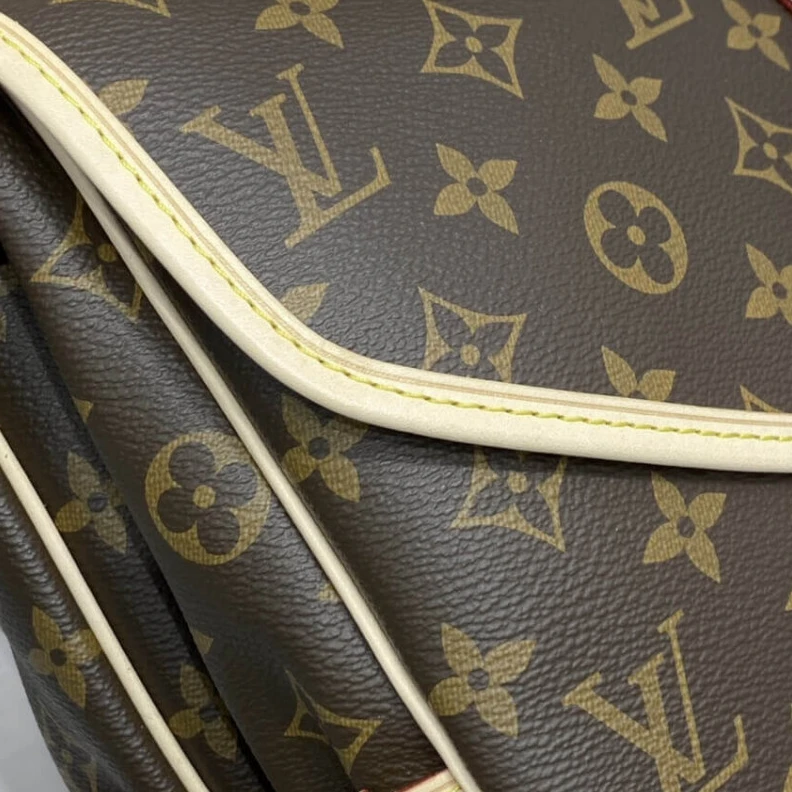 Lv belts replica Embossed Louis Vuitton Monogram Canvas Saumur MM