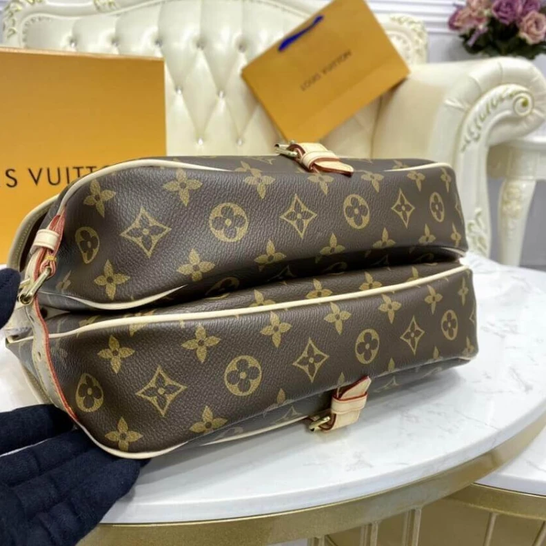Lv belts replica Embossed Louis Vuitton Monogram Canvas Saumur MM
