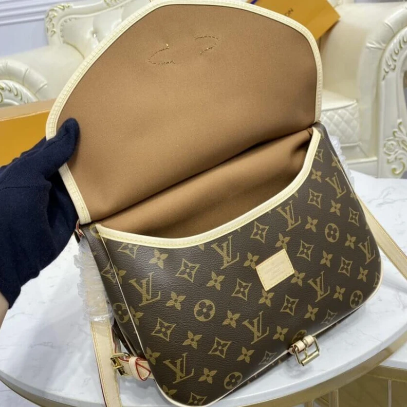 Lv belts replica Embossed Louis Vuitton Monogram Canvas Saumur MM