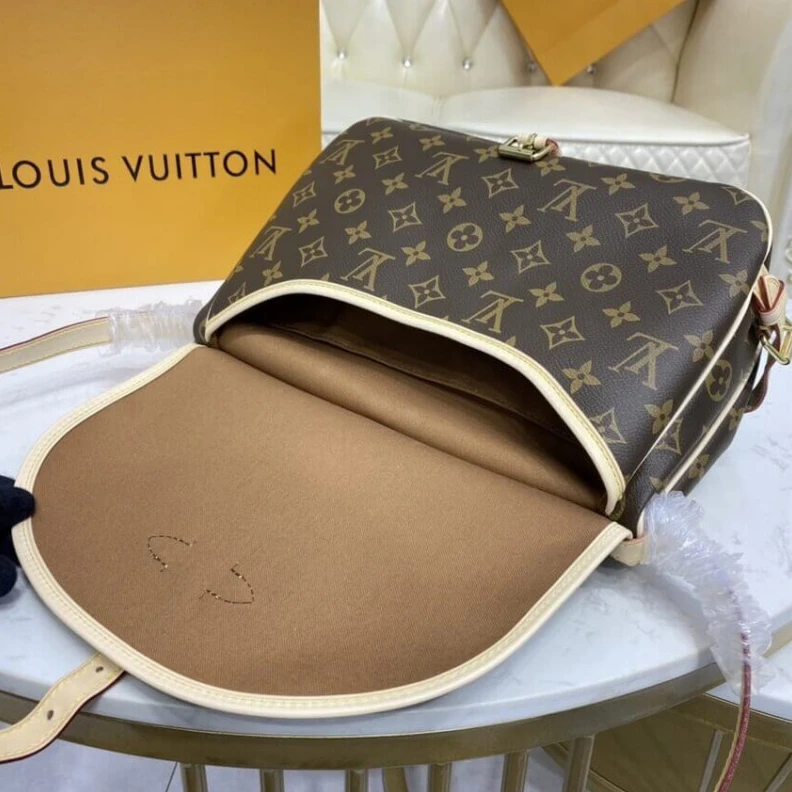 Lv belts replica Embossed Louis Vuitton Monogram Canvas Saumur MM