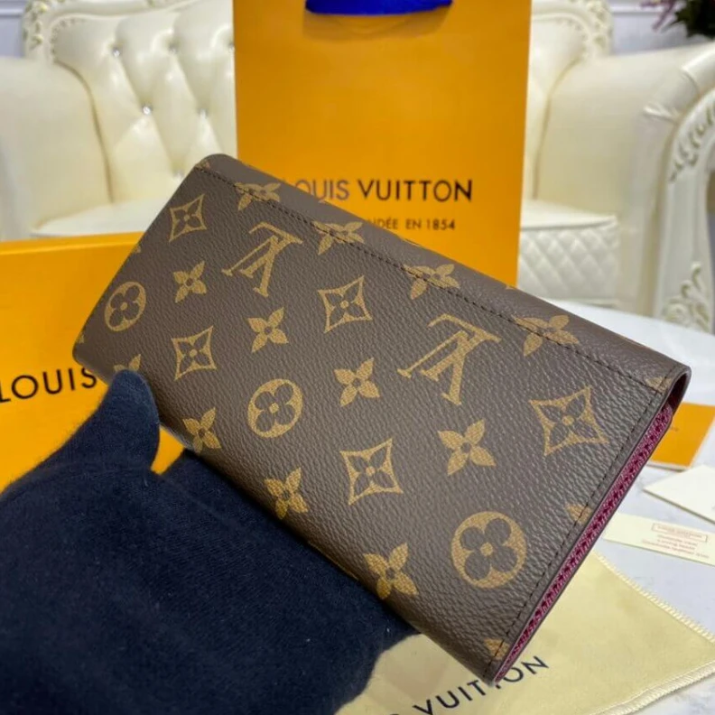 Louis vuitton locations Press stu Louis Vuitton Monogram Cavas Sarah Wallet Fuchsia