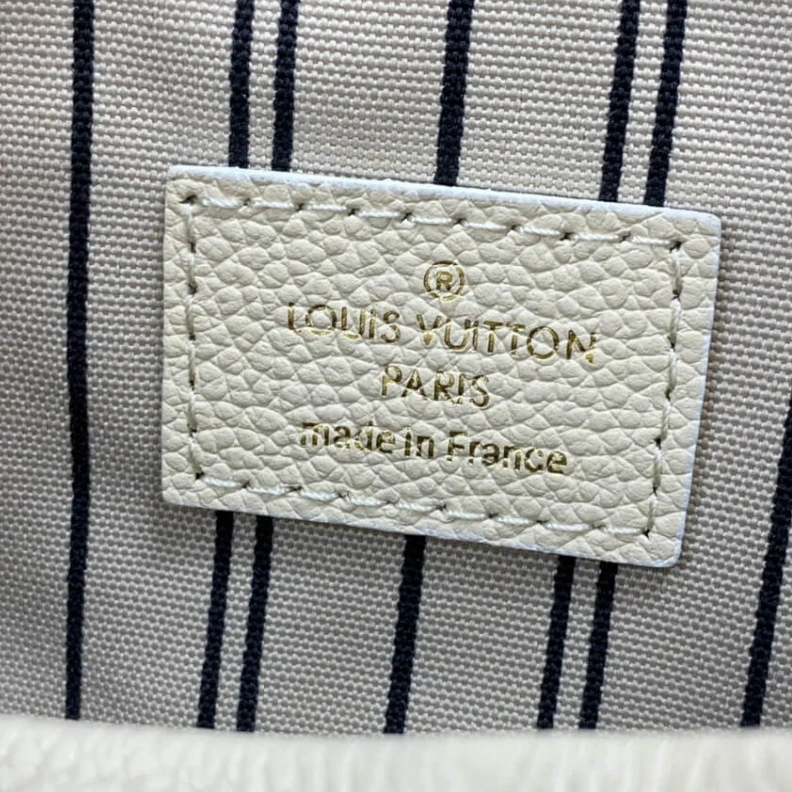 Louis vuitton locations Goldcolor LV Monogram Empreinte Artsy MM Beige