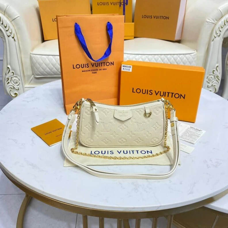 Top lv Louis Vuitton Monogram Empreinte Easy Pouch On Strap Creme
