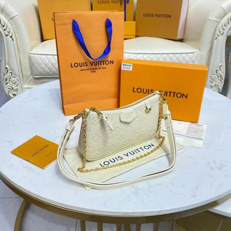 Top lv Louis Vuitton Monogram Empreinte Easy Pouch On Strap Creme