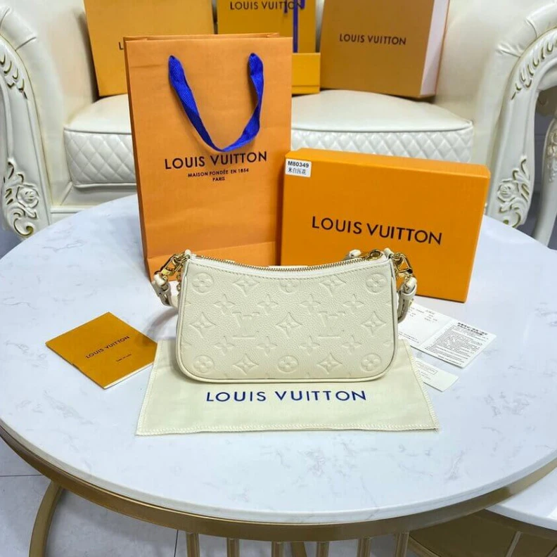 Top lv Louis Vuitton Monogram Empreinte Easy Pouch On Strap Creme