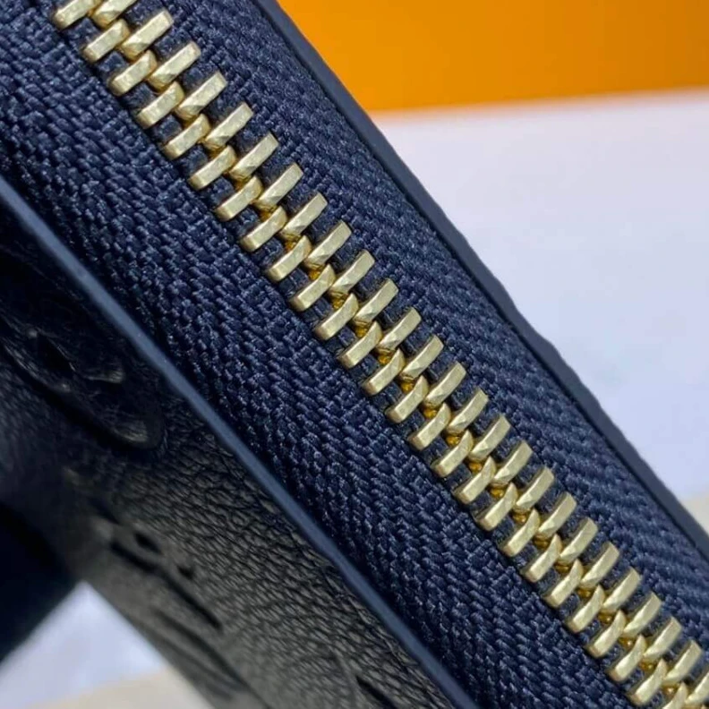 Mythick ru Supple gr Louis Vuitton Monogram Empreinte Leather Clemence Wallet Black