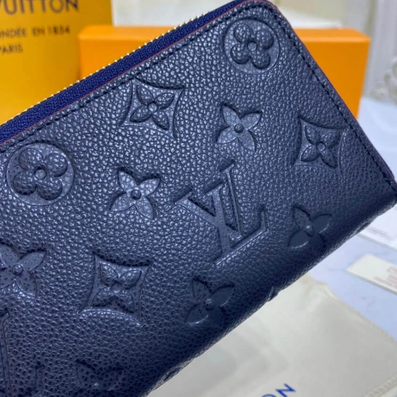 Lv belts replica Goldcolor Louis Vuitton Monogram Empreinte Leather Clemence Wallet M69415
