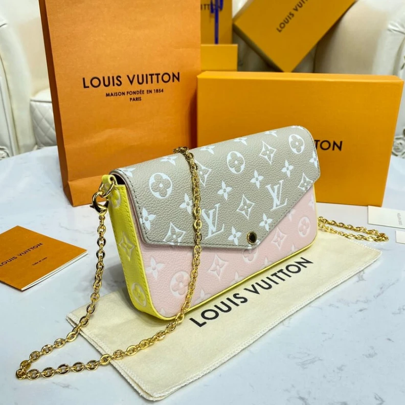 Replica bags lv Chain:Rem Louis Vuitton Monogram Empreinte Leather Felicie Pochette