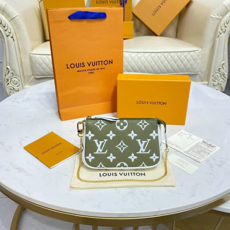 Replica bag Monogram Louis Vuitton Monogram Empreinte Leather Mini Pochette Accessoires Khaki