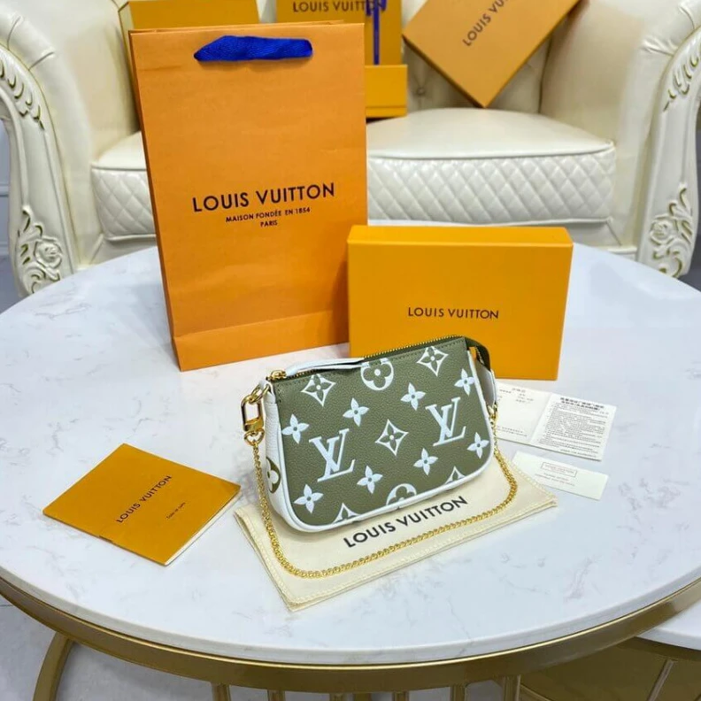 Replica bag Monogram Louis Vuitton Monogram Empreinte Leather Mini Pochette Accessoires Khaki