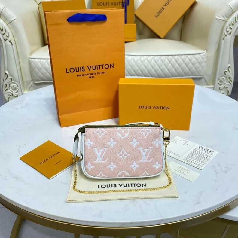 Replica bag Monogram Louis Vuitton Monogram Empreinte Leather Mini Pochette Accessoires Khaki