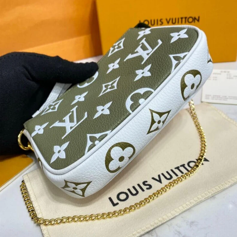 Replica bag Monogram Louis Vuitton Monogram Empreinte Leather Mini Pochette Accessoires Khaki