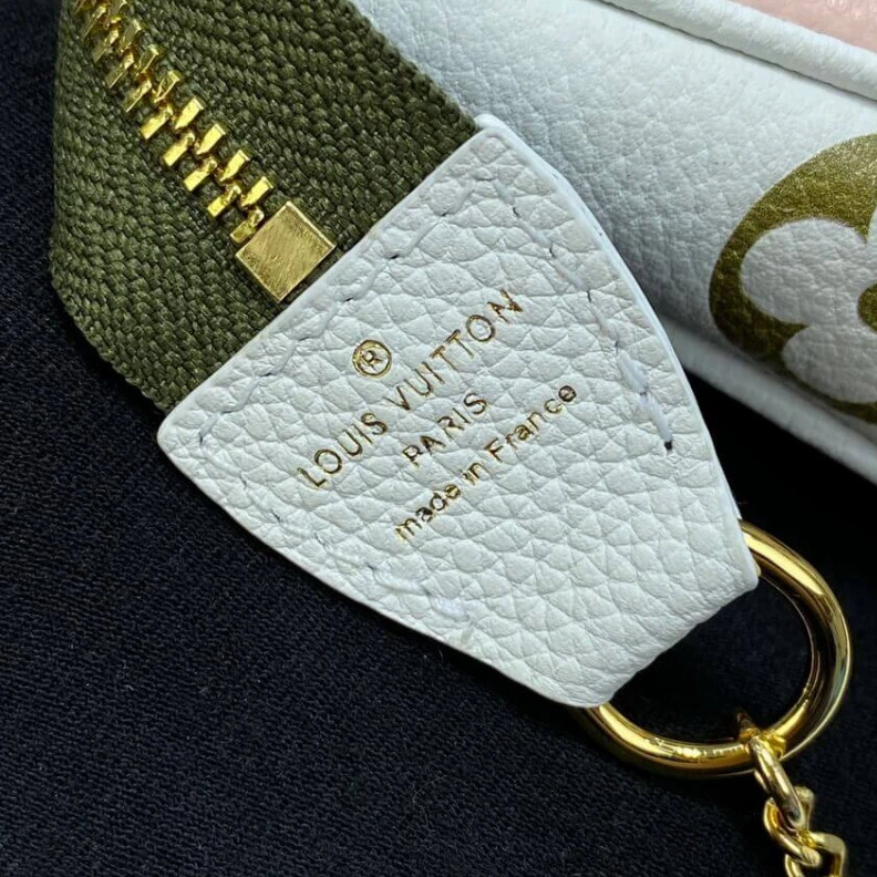 Replica bag Monogram Louis Vuitton Monogram Empreinte Leather Mini Pochette Accessoires Khaki