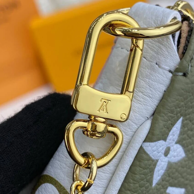 Replica bag Monogram Louis Vuitton Monogram Empreinte Leather Mini Pochette Accessoires Khaki