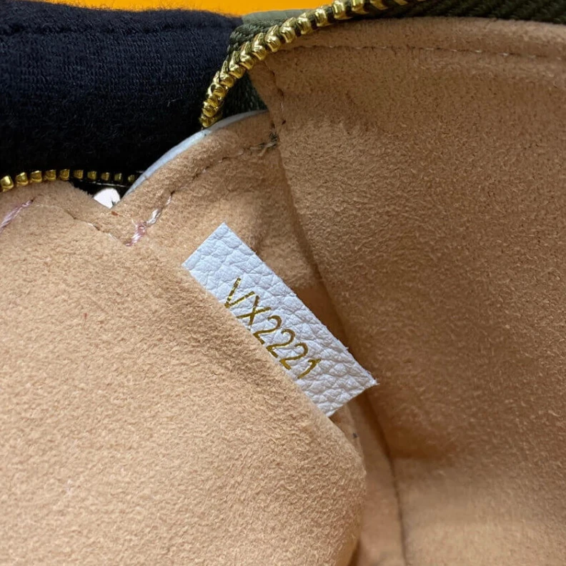 Replica bag Monogram Louis Vuitton Monogram Empreinte Leather Mini Pochette Accessoires Khaki