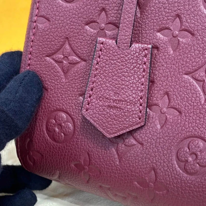 Replica bags lv Key bell Louis Vuitton Monogram Empreinte Leather Montaigne MM Burgundy