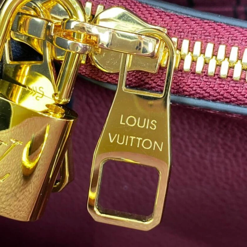Replica bags lv Key bell Louis Vuitton Monogram Empreinte Leather Montaigne MM Burgundy