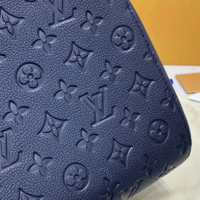 Replica bags lv 2 wide co LV Monogram Empreinte Leather Montaigne MM Marine Rouge