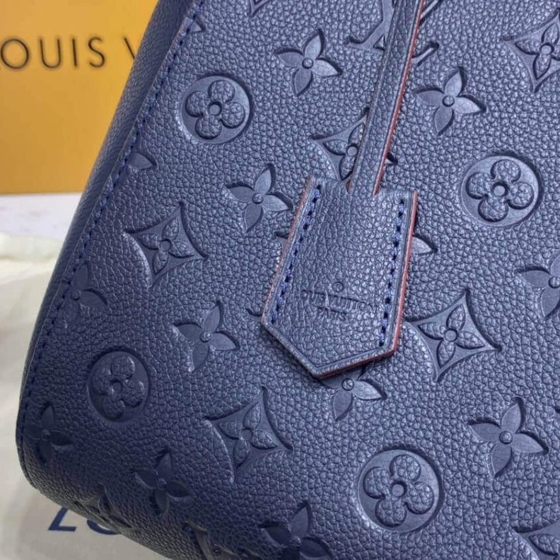 Replica bags lv 2 wide co LV Monogram Empreinte Leather Montaigne MM Marine Rouge