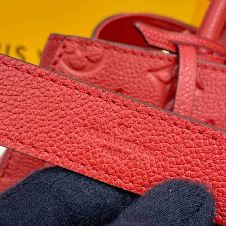 Replica bags lv Key bell Louis Vuitton Monogram Empreinte Leather Montaigne MM Red