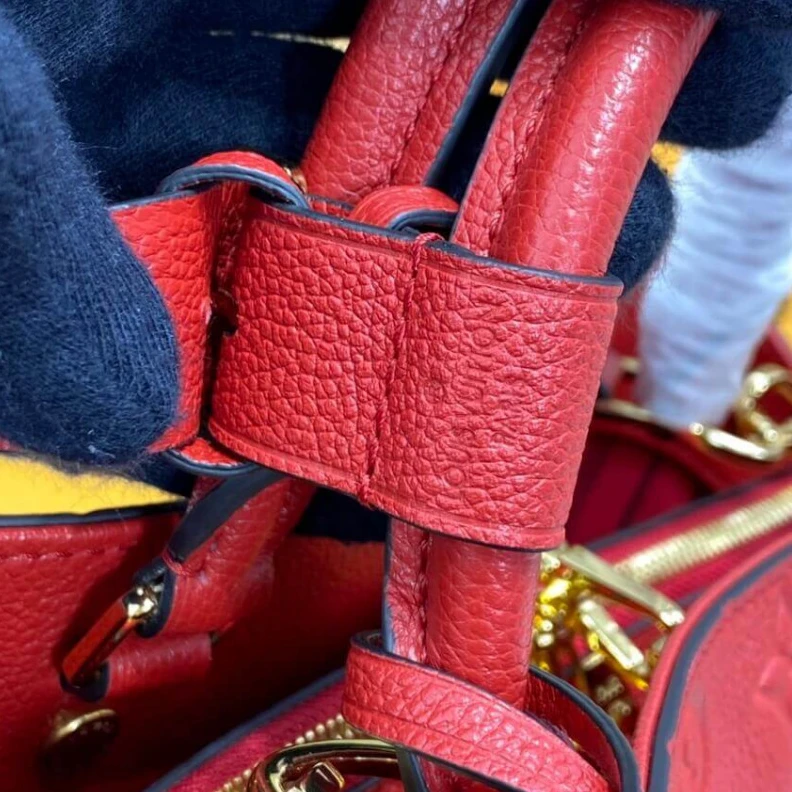 Replica bags lv Key bell Louis Vuitton Monogram Empreinte Leather Montaigne MM Red