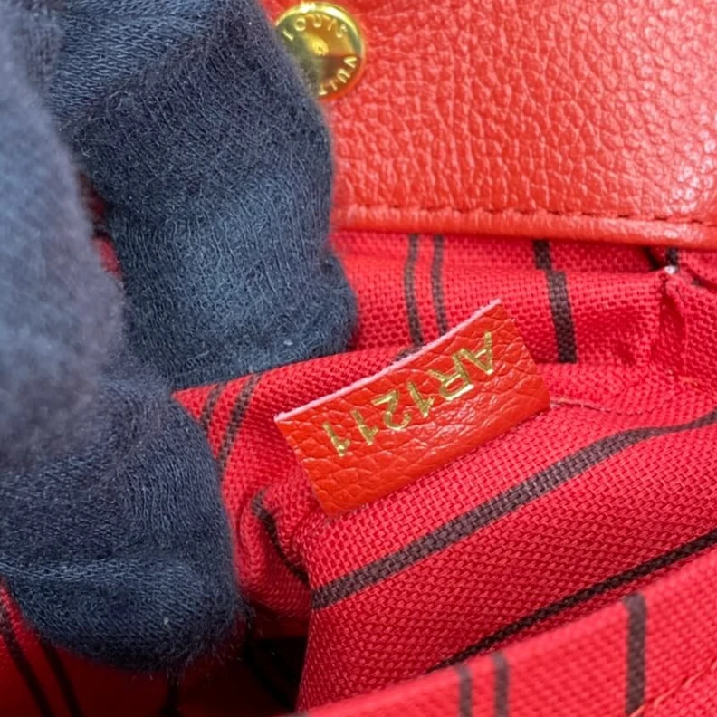 Replica bags lv Key bell Louis Vuitton Monogram Empreinte Leather Montaigne MM Red