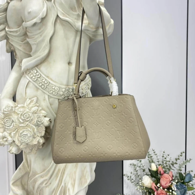 Louis vuitton locations Double sm LV Monogram Empreinte Leather Montaigne MM Tourterelle Grey