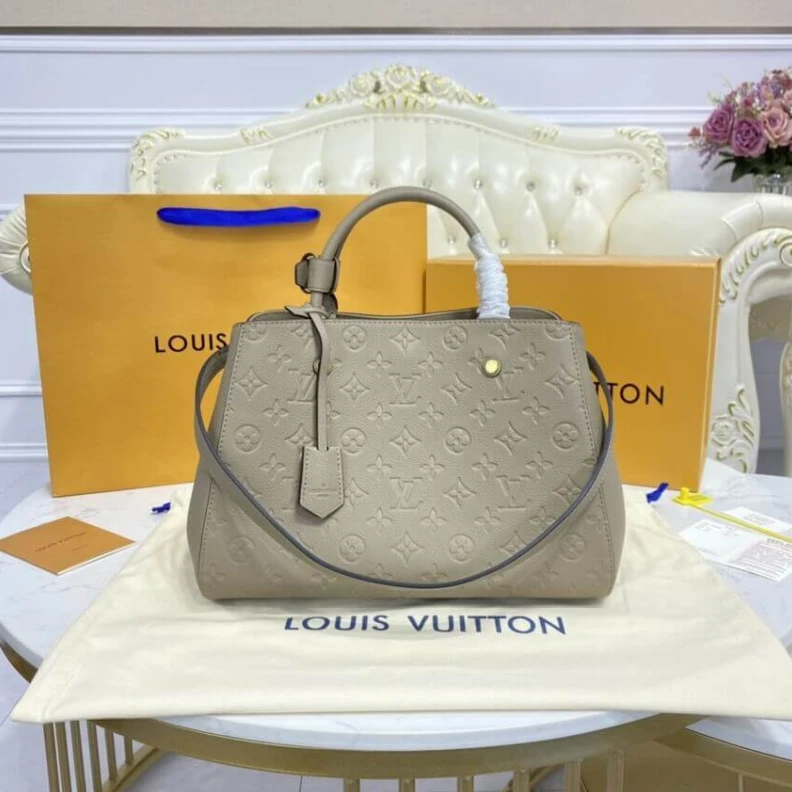 Louis vuitton locations Double sm LV Monogram Empreinte Leather Montaigne MM Tourterelle Grey