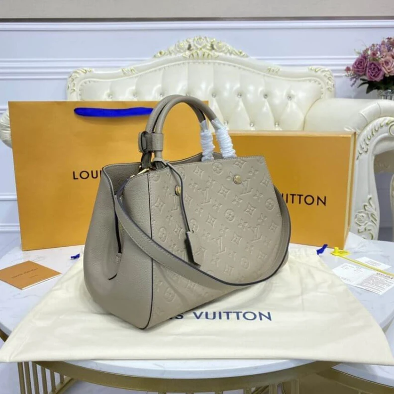 Louis vuitton locations Double sm LV Monogram Empreinte Leather Montaigne MM Tourterelle Grey