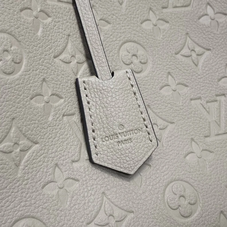 Louis vuitton locations Double sm LV Monogram Empreinte Leather Montaigne MM Tourterelle Grey