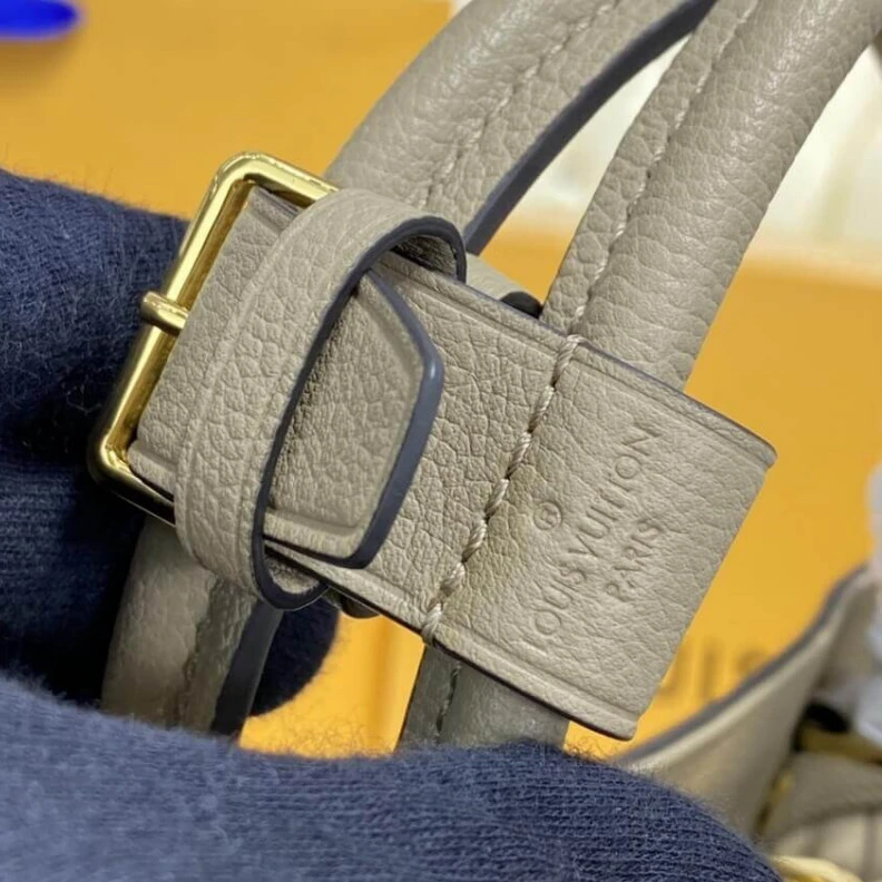 Louis vuitton locations Double sm LV Monogram Empreinte Leather Montaigne MM Tourterelle Grey