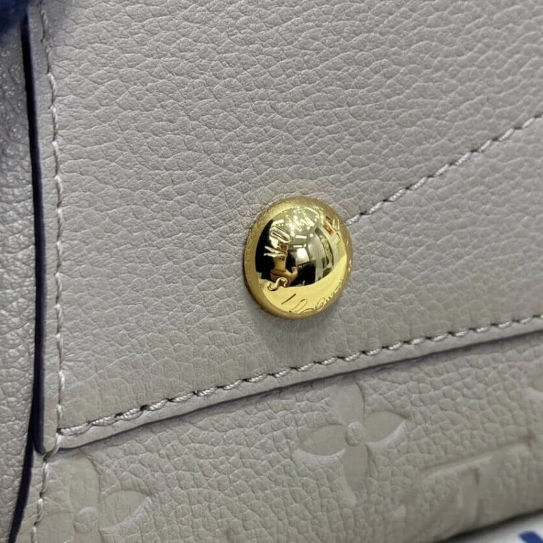 Louis vuitton locations Double sm LV Monogram Empreinte Leather Montaigne MM Tourterelle Grey