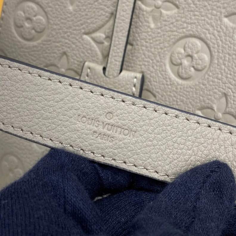 Louis vuitton locations Double sm LV Monogram Empreinte Leather Montaigne MM Tourterelle Grey