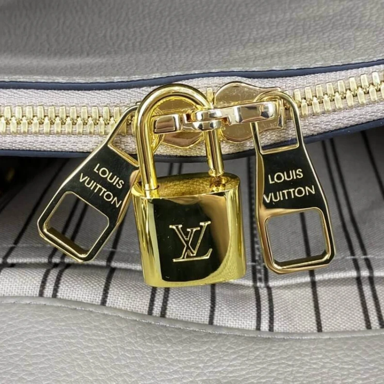 Louis vuitton locations Double sm LV Monogram Empreinte Leather Montaigne MM Tourterelle Grey