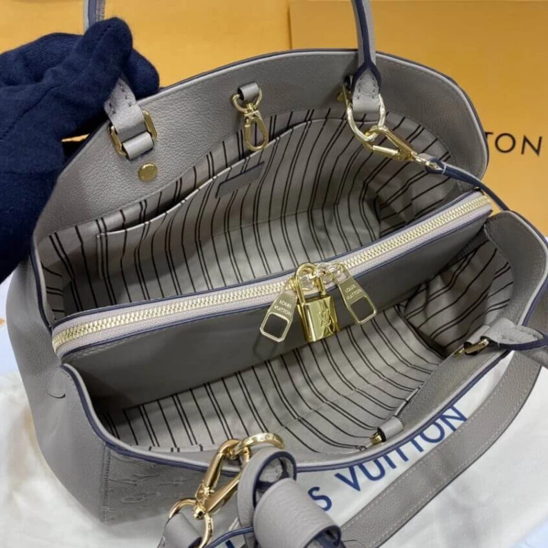 Louis vuitton locations Double sm LV Monogram Empreinte Leather Montaigne MM Tourterelle Grey