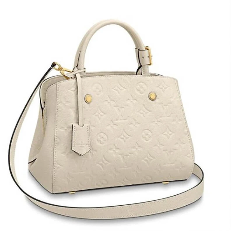 Central z Louis Vuitton Monogram Empreinte Leather Montaigne MM White