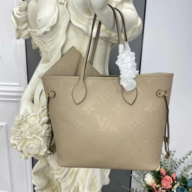 Mythick.ru The essent Louis Vuitton Monogram Empreinte Leather Neverfull MM Tourterelle Gray