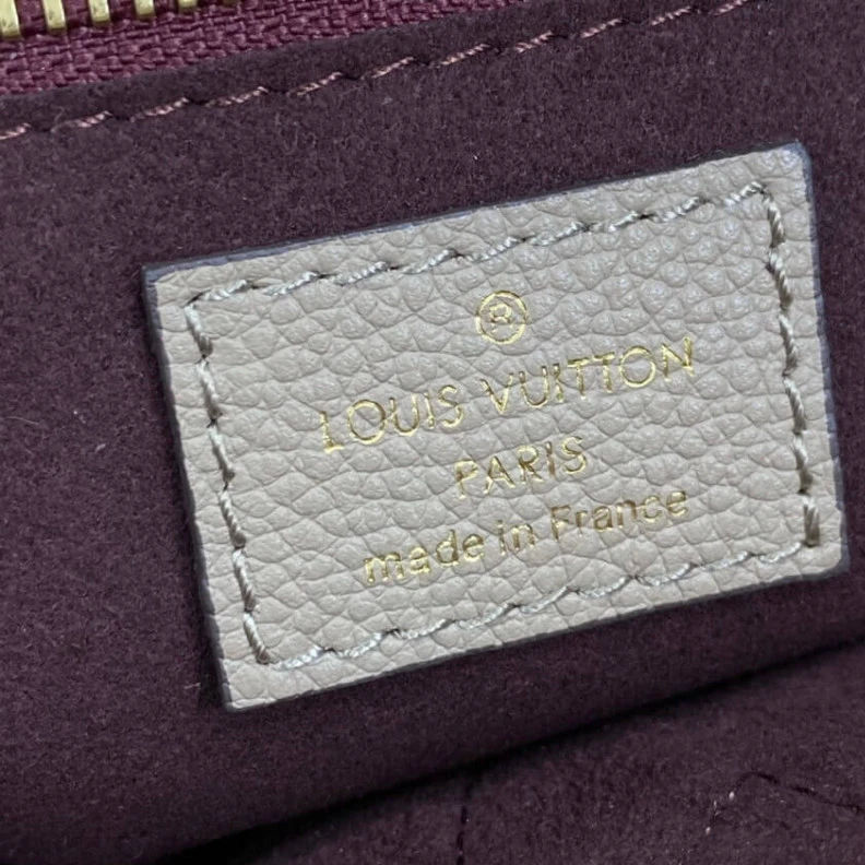 Mythick.ru The essent Louis Vuitton Monogram Empreinte Leather Neverfull MM Tourterelle Gray